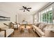 Comfortable living room with hardwood floors, stylish furniture, and large windows at 2685 Harrington Dr, Decatur, GA 30033