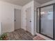 Bathroom with a shower and gray wood-look floors at 432 Creekside Park, Covington, GA 30014