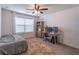 Bedroom with desk, bed, and large window at 432 Creekside Park, Covington, GA 30014