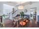 Elegant dining room with coffered ceilings, a modern chandelier, and views of the staircase and entryway at 432 Creekside Park, Covington, GA 30014