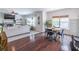 Open-concept living area boasts natural light, fireplace, and seamless flow to dining space, perfect for entertaining at 432 Creekside Park, Covington, GA 30014