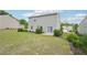 Lawn space with access to a patio area for outdoor activities and relaxation at 4615 Elmwood Trl, Cumming, GA 30028