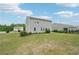 Private backyard offers a large lawn and seamless indoor/outdoor living with a patio at 4615 Elmwood Trl, Cumming, GA 30028