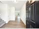 The entry way is well lit and leads into an open-concept living room and kitchen at 4615 Elmwood Trl, Cumming, GA 30028