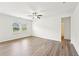 This room features wood-look floors, lots of natural light, and neutral paint at 4615 Elmwood Trl, Cumming, GA 30028