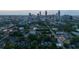 Daytime aerial view showcases the property’s location and the cityscape, blending urban and residential elements at 94 Hogue Ne St, Atlanta, GA 30312
