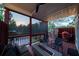 Outdoor kitchen with a red grill and covered porch at 94 Hogue Ne St, Atlanta, GA 30312