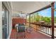 Relaxing back porch with a ceiling fan and a view of the backyard at 94 Hogue Ne St, Atlanta, GA 30312