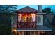 Two story back deck, with pergola, lighting, and outdoor seating at 94 Hogue Ne St, Atlanta, GA 30312