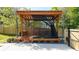 Custom wooden structure with covered deck providing outdoor relaxation and recreation at 94 Hogue Ne St, Atlanta, GA 30312