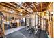 Basement setup as a home gym with fitness equipment, weights, and exposed ceiling details at 94 Hogue Ne St, Atlanta, GA 30312