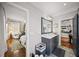 Bathroom features marble counters, a sink, and modern fixtures with a view into the bedroom at 94 Hogue Ne St, Atlanta, GA 30312