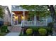 Beautiful two-story home with a covered porch, flower boxes, and professionally landscaped yard at 94 Hogue Ne St, Atlanta, GA 30312