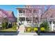 Charming two-story home featuring a double porch and beautiful landscaping at 94 Hogue Ne St, Atlanta, GA 30312