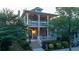 Charming two-story home with a welcoming front porch and beautifully landscaped front yard at 94 Hogue Ne St, Atlanta, GA 30312