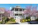 Beautiful two story home with inviting double porches and manicured landscaping at 94 Hogue Ne St, Atlanta, GA 30312