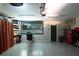 Versatile garage with projector screen setup perfect for entertainment, along with epoxy floors and ample storage at 94 Hogue Ne St, Atlanta, GA 30312