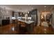 Stylish kitchen with a quartz-topped island, stainless steel appliances, and wooden floor at 94 Hogue Ne St, Atlanta, GA 30312