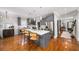 Charming kitchen with gray cabinets, stainless appliances, and a center island with bar seating at 94 Hogue Ne St, Atlanta, GA 30312
