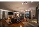 Elegant living room with a fireplace, hardwood floors, and lots of natural light at 94 Hogue Ne St, Atlanta, GA 30312