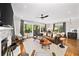 Bright living room with a fireplace, hardwood floors, and elegant furnishings at 94 Hogue Ne St, Atlanta, GA 30312