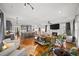 Spacious living room open to the kitchen with hardwood floors and stylish decor at 94 Hogue Ne St, Atlanta, GA 30312