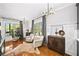 Bright living room with hardwood floors, modern lighting, and stylish decor for a welcoming ambiance at 94 Hogue Ne St, Atlanta, GA 30312