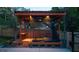Backyard pergola with seating and privacy screening, providing a cozy outdoor retreat at 94 Hogue Ne St, Atlanta, GA 30312
