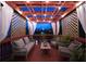 Charming rooftop deck with string lights, comfortable seating, and a lattice privacy screen at 94 Hogue Ne St, Atlanta, GA 30312