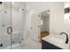 Modern bathroom features a glass enclosed shower, new fixtures, and stylish design at 1026 Reeder Cir, Atlanta, GA 30306