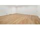 Bedroom is spacious with hardwood floors, fresh paint, and two doors at 1026 Reeder Cir, Atlanta, GA 30306