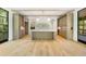 Bright, modern kitchen with a large island, stylish countertops, and custom cabinets at 1026 Reeder Cir, Atlanta, GA 30306