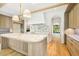 Modern kitchen with a marble island, custom cabinets, and high-end finishes at 1026 Reeder Cir, Atlanta, GA 30306