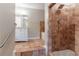Bathroom showcasing a vanity, tub, and tiled walk-in shower at 1615 Enchanted Forest Dr, Conley, GA 30288