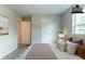 Tastefully staged bedroom featuring carpet, a closet, and a doorway for style and function at 1615 Enchanted Forest Dr, Conley, GA 30288