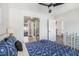 Bedroom featuring ensuite bathroom and kitchen view at 215 Piedmont Ne Ave # 2210, Atlanta, GA 30308