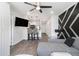 Open living space with modern kitchen, comfortable seating, and contemporary black and white wall design at 215 Piedmont Ne Ave # 2210, Atlanta, GA 30308