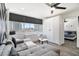 Bright living room featuring city views, comfortable seating, and stylish white storage cabinets at 215 Piedmont Ne Ave # 2210, Atlanta, GA 30308