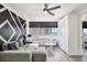 Cozy living room with comfortable seating, large windows offering city views, and stylish decor at 215 Piedmont Ne Ave # 2210, Atlanta, GA 30308