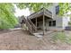 Exterior view of a deck with staircase to the backyard with ample lawn space at 4290 Grand Teton Pkwy, Suwanee, GA 30024