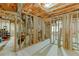 Unfinished basement featuring exposed duct work, wooden beams, and concrete flooring at 4290 Grand Teton Pkwy, Suwanee, GA 30024