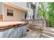 Private wooden deck featuring hot tub and outdoor seating area at 4290 Grand Teton Pkwy, Suwanee, GA 30024