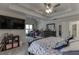 Large main bedroom with tray ceilings, a ceiling fan, and ample space for furniture at 4290 Grand Teton Pkwy, Suwanee, GA 30024