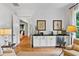 Charming bar area features custom cabinets, a beverage fridge, and stylish decor at 5134 Pratt Sw St, Covington, GA 30014
