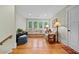Inviting bonus room featuring hardwood floors, cozy seating and plenty of natural light at 5134 Pratt Sw St, Covington, GA 30014