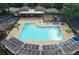 Community pool with solar panels, seating areas, and a playground, perfect for outdoor Gathering fun at 5134 Pratt Sw St, Covington, GA 30014