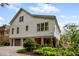 Exterior elevation shows a two-story home with a brick foundation, garage, and professionally landscaped yard at 5134 Pratt Sw St, Covington, GA 30014