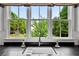 Kitchen sink view from the window overlooking the backyard at 5134 Pratt Sw St, Covington, GA 30014