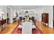 Open living space with hardwood floors, fireplace, and dining area at 5134 Pratt Sw St, Covington, GA 30014