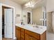 This bathroom has a double sink vanity and an adjoining walk-in closet at 635 Crosswinds Cir, Marietta, GA 30008